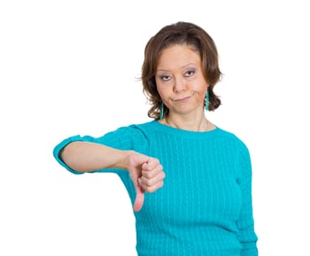 Closeup portrait of unhappy angry mad, pissed off senior mature woman, annoyed, giving thumbs down looking with negative facial expression disapproval, isolated white background. Emotion, sign, symbol.jpeg