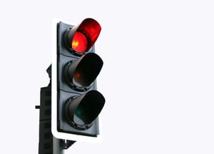 Isolated red traffic light