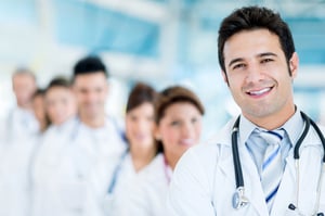 Male doctor at the hospital with his team-1