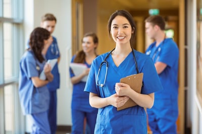 Medical student smiling at the camera at the university