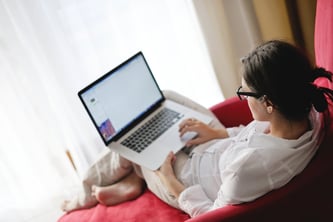 happy young woman relax at home on sofa